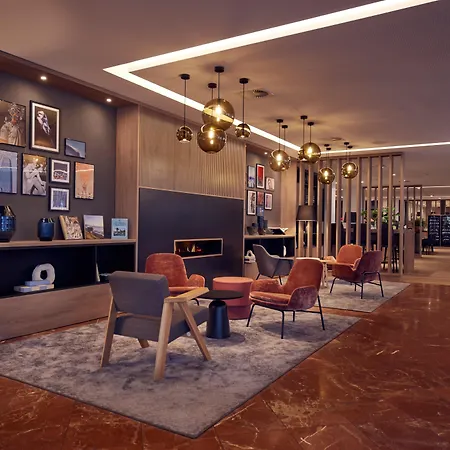 Отель Doubletree By Hilton Schweizerhof 4*