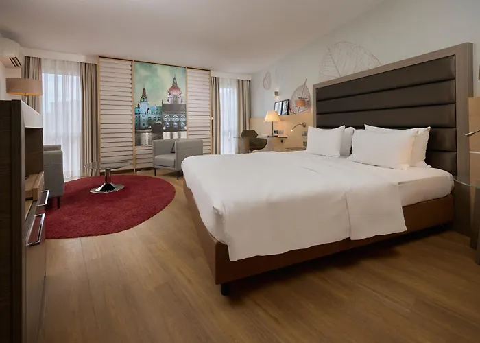 Отель Doubletree By Hilton Schweizerhof 4*