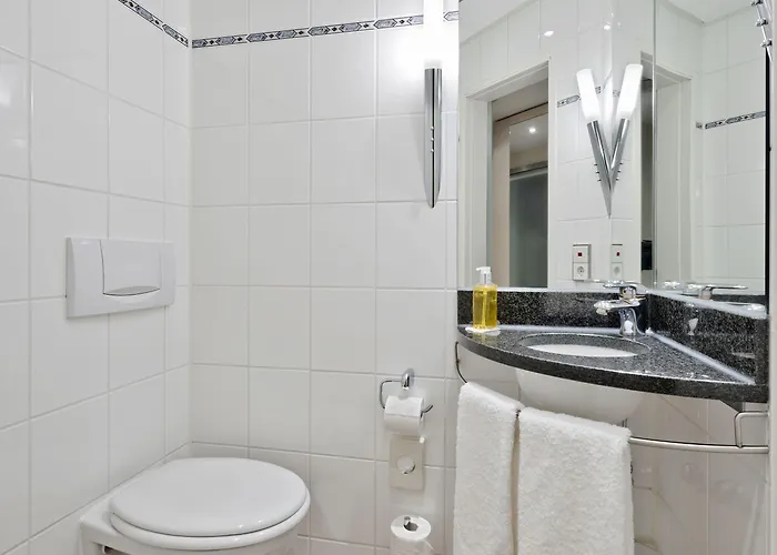 Отель Doubletree By Hilton Schweizerhof 4*