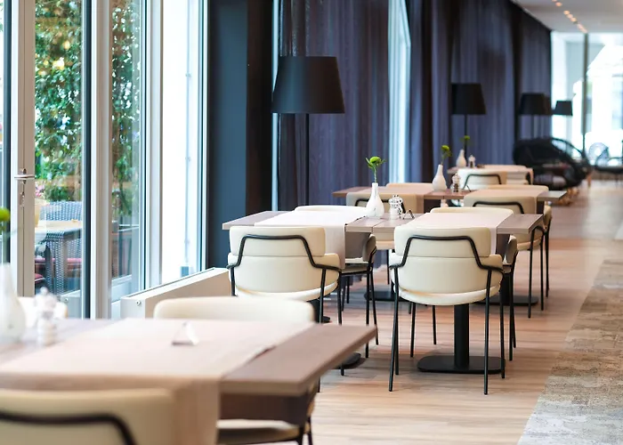 Отель Doubletree By Hilton Schweizerhof