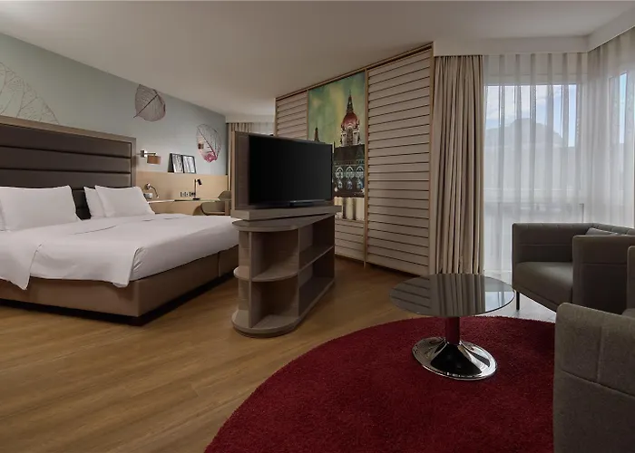 Отель Doubletree By Hilton Schweizerhof